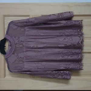 Mauve blouse; sheer lace sleeves and shoulders; back double button